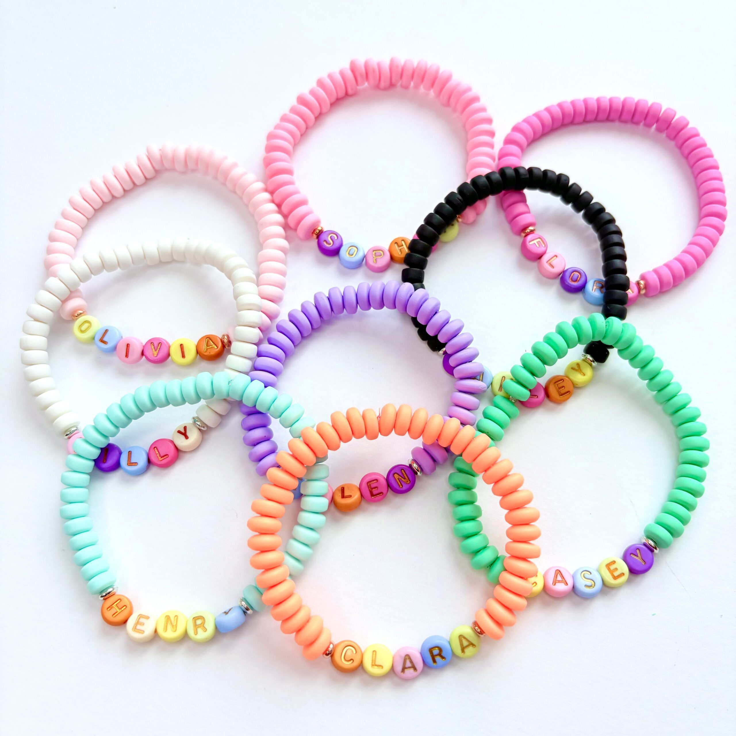 Sweet like candy personalised bracelet set all the different colours of bracelets laid out
