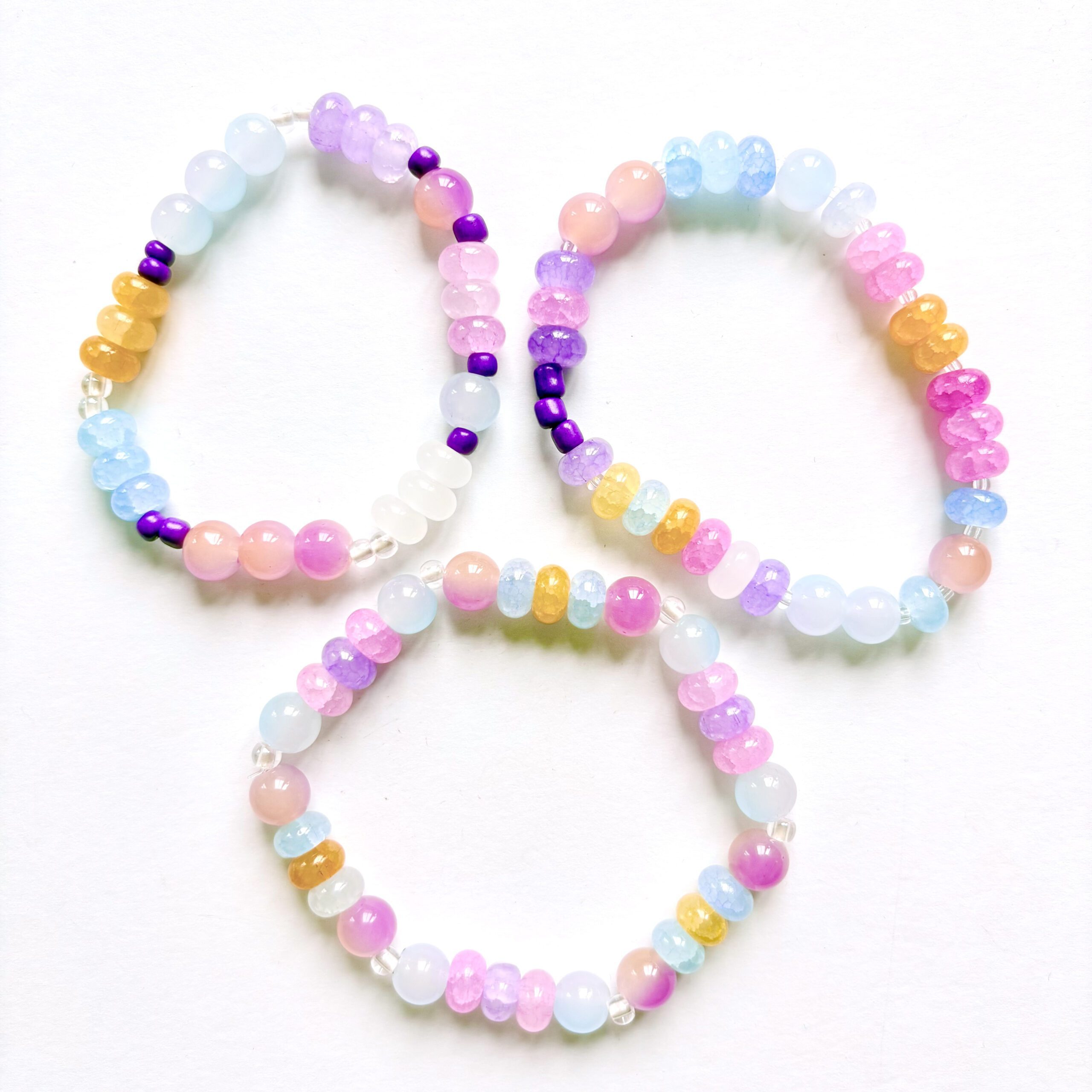 sunset jewellery making set sunset jewellery making set. 1 necklace and 3 bracelets in pink, purple and yellow colours