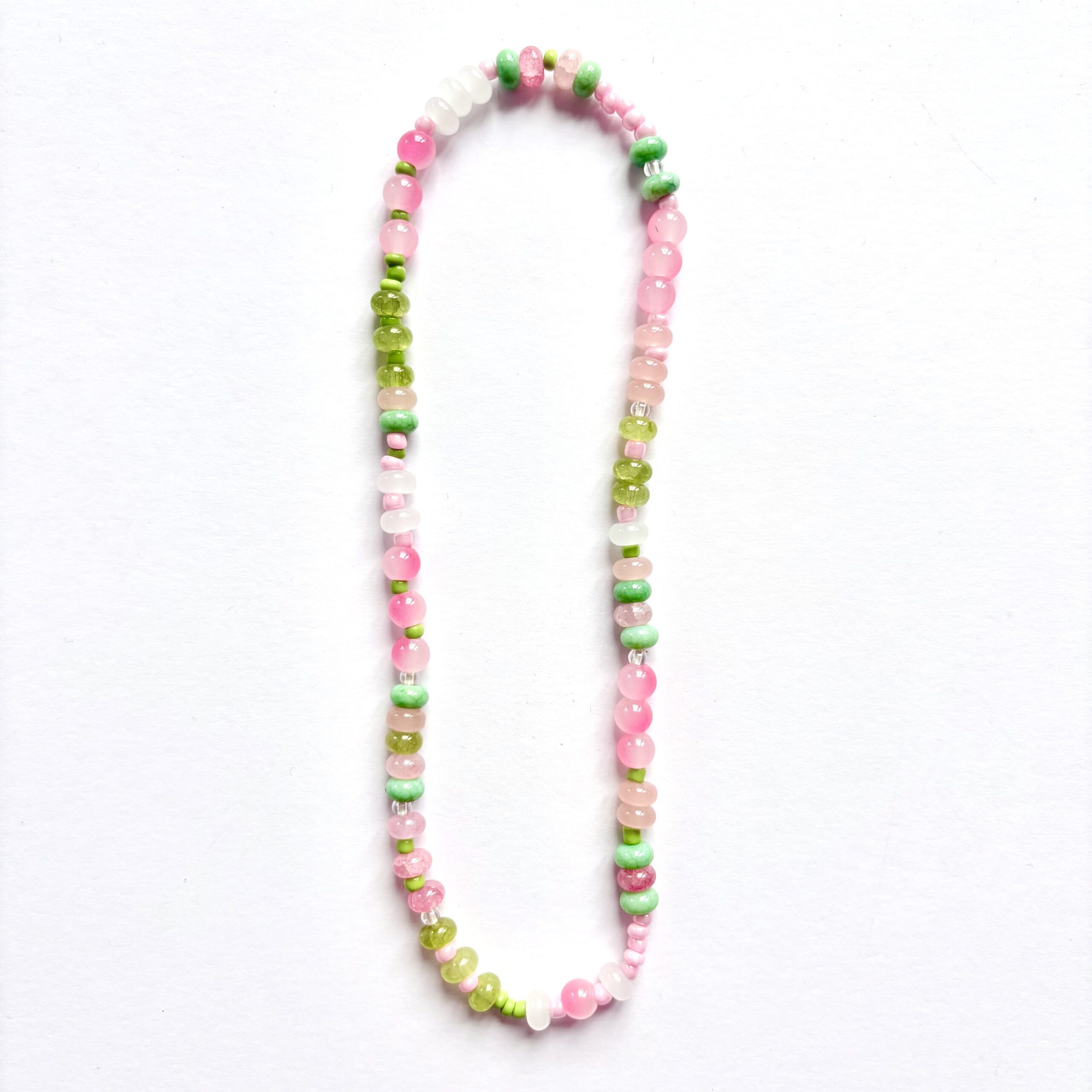 apple crisp jewellery making set apple crisp jewellery making set. 1 necklace and 3 bracelets in pink and green colours